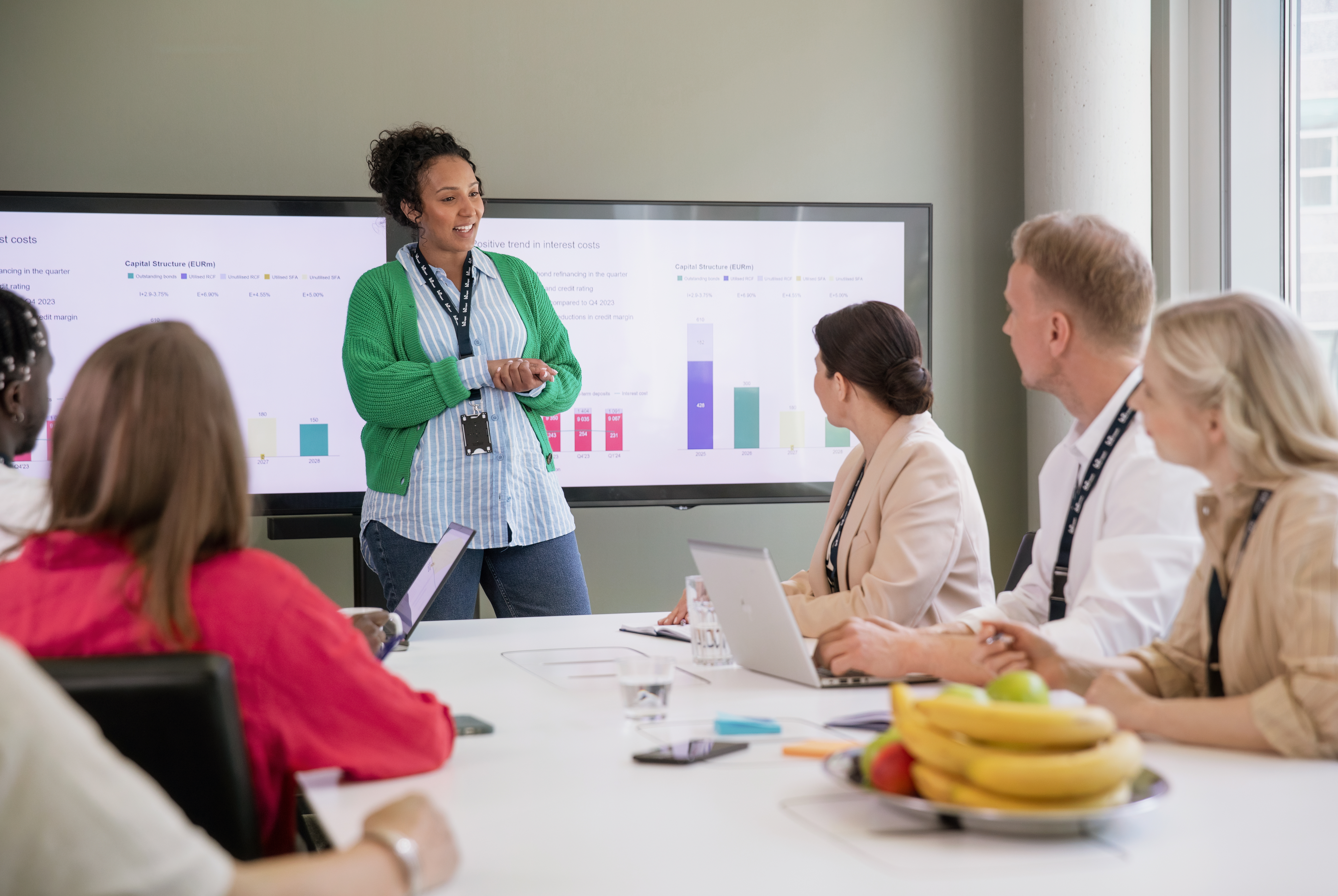 A diverse group of people in a meeting room