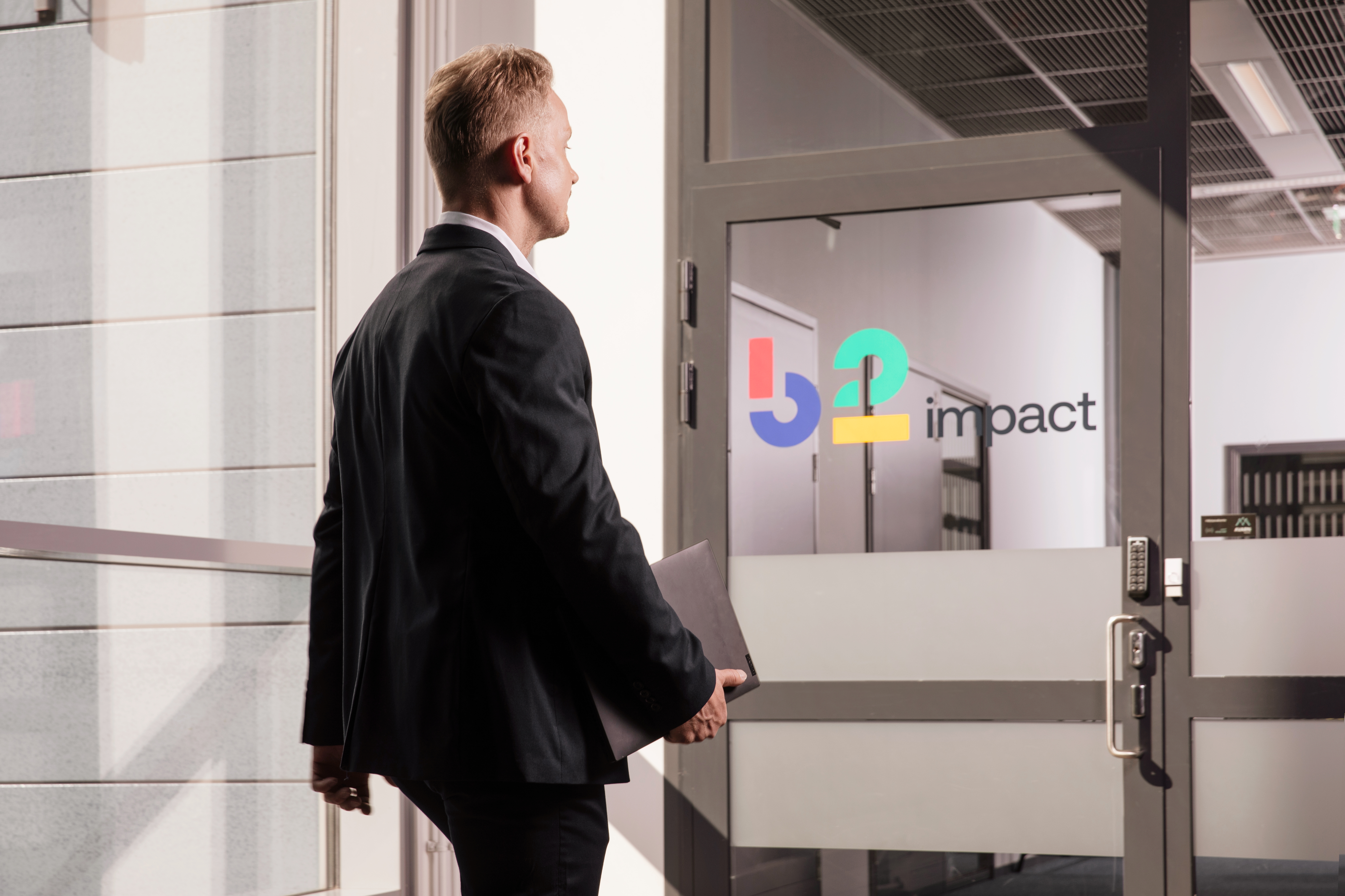 Man walking in a modern office building